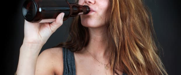 woman drinking alcohol