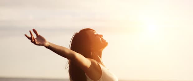woman looking into sky