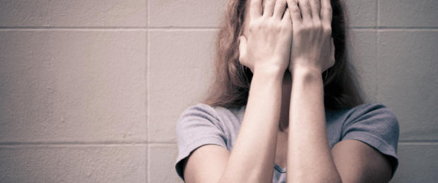 woman on meth with head in her hands